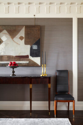 Dining room detail featuring a Buffa sideboard and a painting by Kenzo Okada