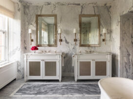 Master bath detail featuring custom designed vanities