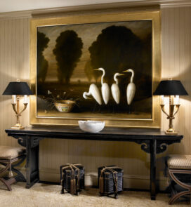 Entry to primary suite of Lincoln Park residence with gilt-framed painting by David Kroll
