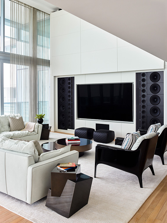 Sound and AV system featuring Steinway speaker system in contemporary great room