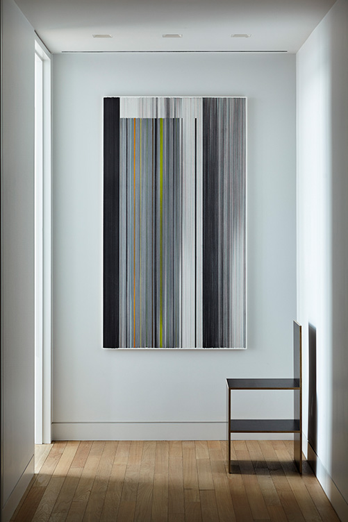 Hallway detail with artwork by Anne Lindberg and plywood chair by Donald Judd