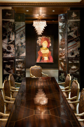 Chicago Skyline penthouse dining table, antique screens and artwork by Manolo Valdes