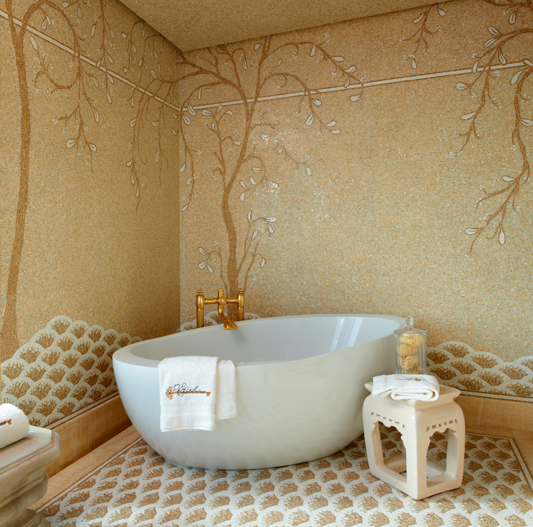Chicago skyline penthouse wet room detail with honey onyx mosaic and large soaking tub