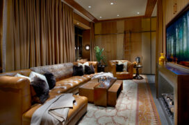 Chicago skyline penthouse media room with leather sofa