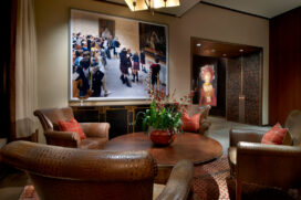 Chicago skyline penthouse seating area off kitchen with artwork