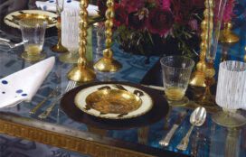 Detail of table place setting with hand painted and gilded soup bowl