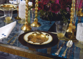 Detail of table place setting with hand painted and gilded soup bowl
