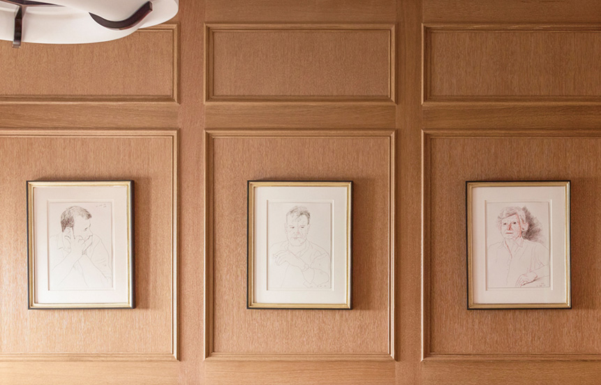 Detail of paneled millwork designed specifically for a collection of David Hockney portaits