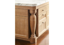 Detail of kitchen island with cerused oak base