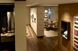 Lincoln Park Chicago landmark residence view to foyer and dining room with display cabinet made of goatskin panels