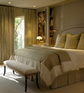 Lincoln Park Chicago landmark residence primary bedroom in neutral colors with artwork by Andrea Wasserman and view towards window