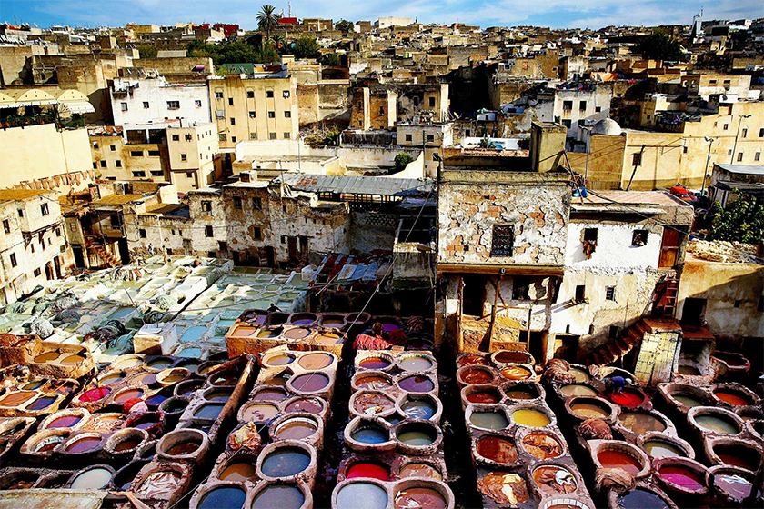 A view from the terrace at the Chouara Tannery in Fez across the colorful dying pits below