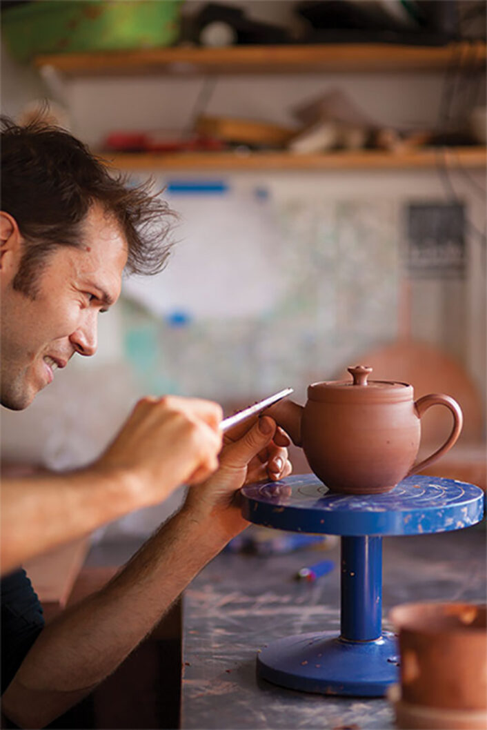 Ceramicist Jono Pandolfi at work in his studio