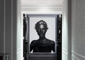St. Regis, NY owner’s suite entry view from hall with artwork by Nick Knight