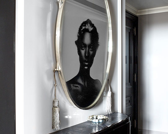 St. Regis, NY owner’s suite entry with artwork by Nick Knight reflected in an original Ruhlmann mirror