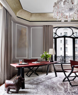 St. Regis, NY owner’s suite study with view of Hermes desk and chair and Baccarat chandelier