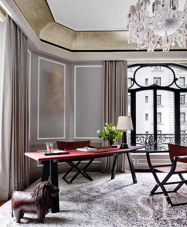 St. Regis, NY owner’s suite study with view of Hermes desk and chair and Baccarat chandelier