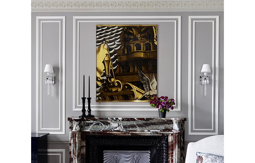 Fireplace detail featuring panel by Dupas and Baccarat sconces