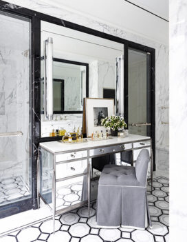 St. Regis, NY owner’s suite ‘her’ bathroom detail view of vanity with artwork by Irving Penn and Waterworks mosaics and stone slabs