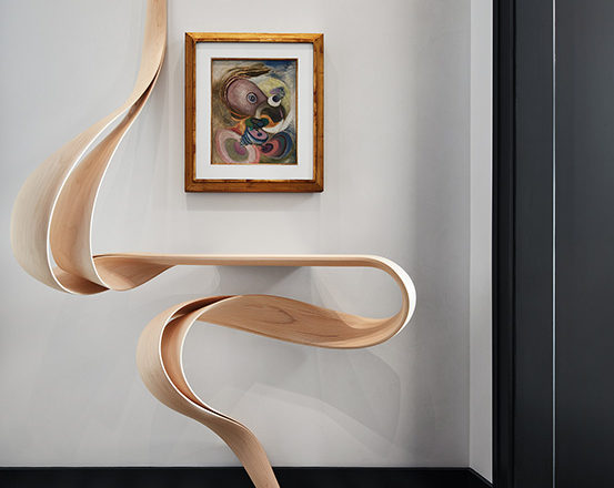 Entryway in Lincoln Park residence with Enignum Shelf by Joseph Walsh and painting by Wolfgang Paalen