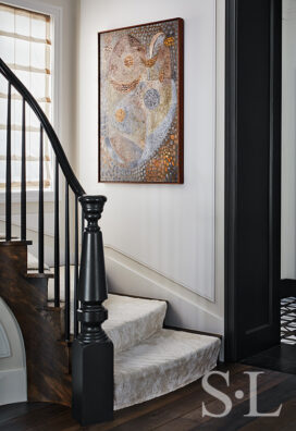 Stairway in Lincoln Park residence with painting by Wolfgang Paalen