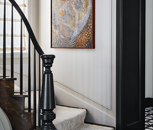 Stairway in Lincoln Park residence with painting by Wolfgang Paalen