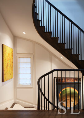 Lincoln Park residence stair with painting by Lee Mullican