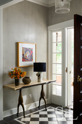 Entry of Oak Park Landmark Residence with black and white stone floor