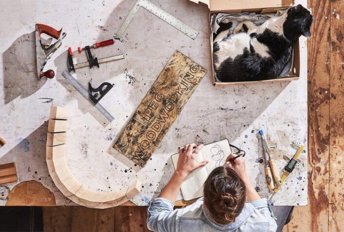 Kate Casey (and cat!) in her Peg Woodworking design studio