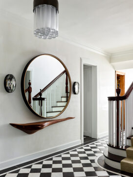 Foyer detail of Oak Park Landmark Residence with large mirror by BDDW