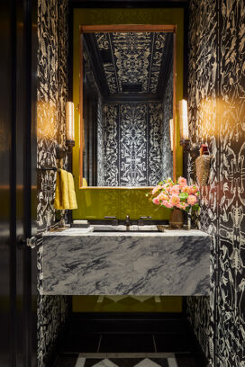 Oak Park Landmark residence powder room with Waterworks sink hardware and accessories