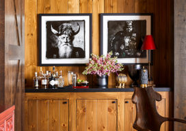 Lakeside residence bar with knotty pine and artwork by Sandro Miller