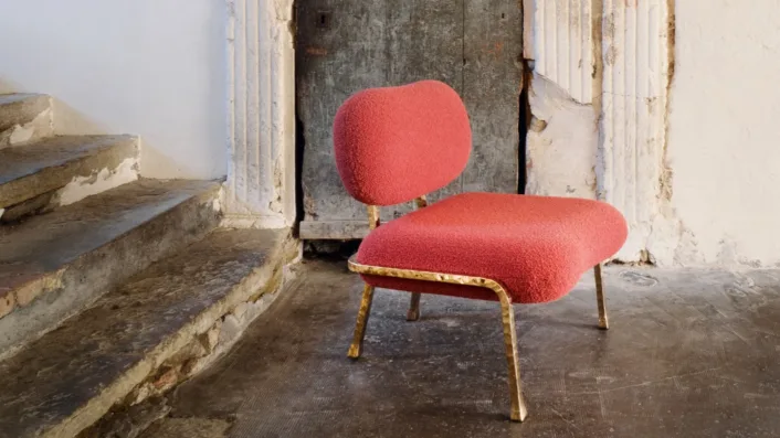 Brass and fabric Hopper armchair.