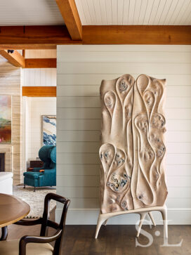 Dining room of luxury vacation residence on Hilton Head Island with custom cabinet by Joseph Walsh