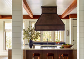 Kitchen of luxury vacation residence on Hilton Head Island with custom range hood