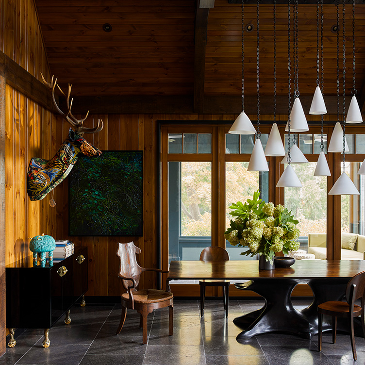 Lakeside home dining room with rustic interior design touches