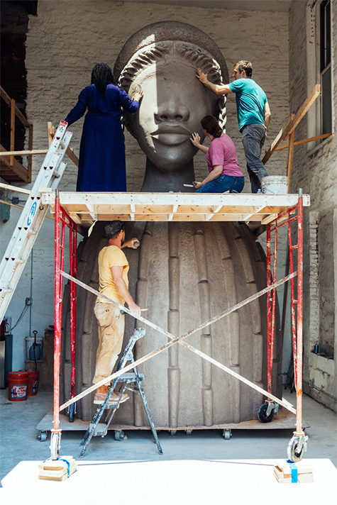 Simone Leigh and her crew at work on a sculpture