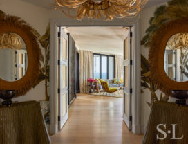 Guest suite hallway of Naples penthouse designed by Suzanne Lovell