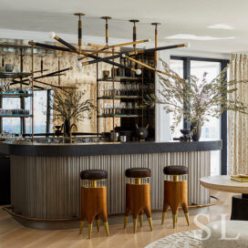 Wet bar in great room of Naples penthouse designed by Suzanne Lovell