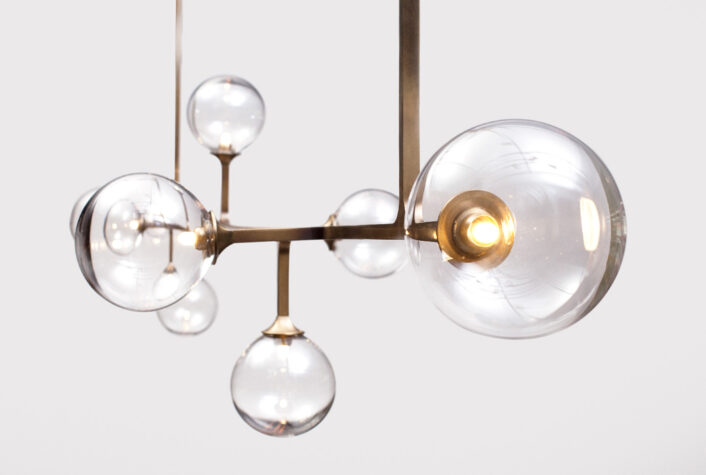 Helix Horizontal Pendant, brass and hand-blown glass.