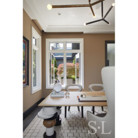 Home office designed by Suzanne Lovell with India Mahdavi’s SuperStarr Table