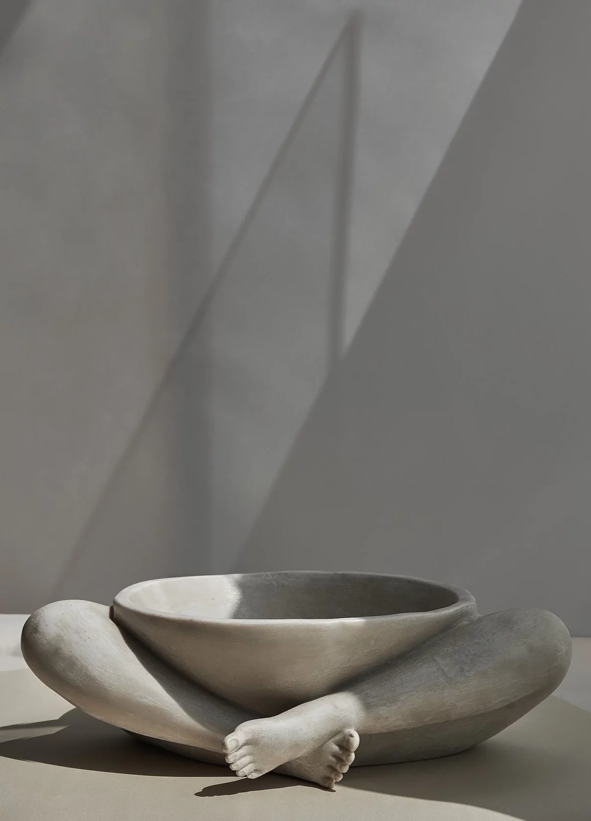Sukhasana II Bowl, a resin and stone composite.