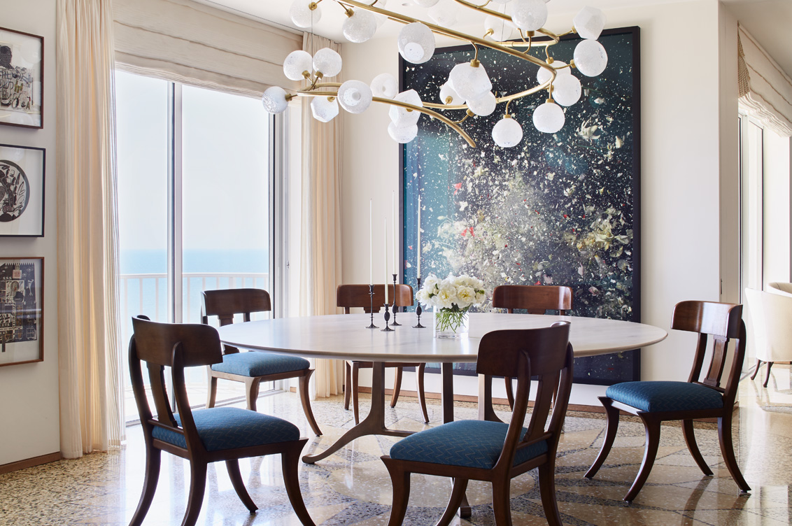 Gulf Coast Penthouse dining room featuring artwork by Ori Gersht architecture and interior design by Suzanne Lovell Inc.